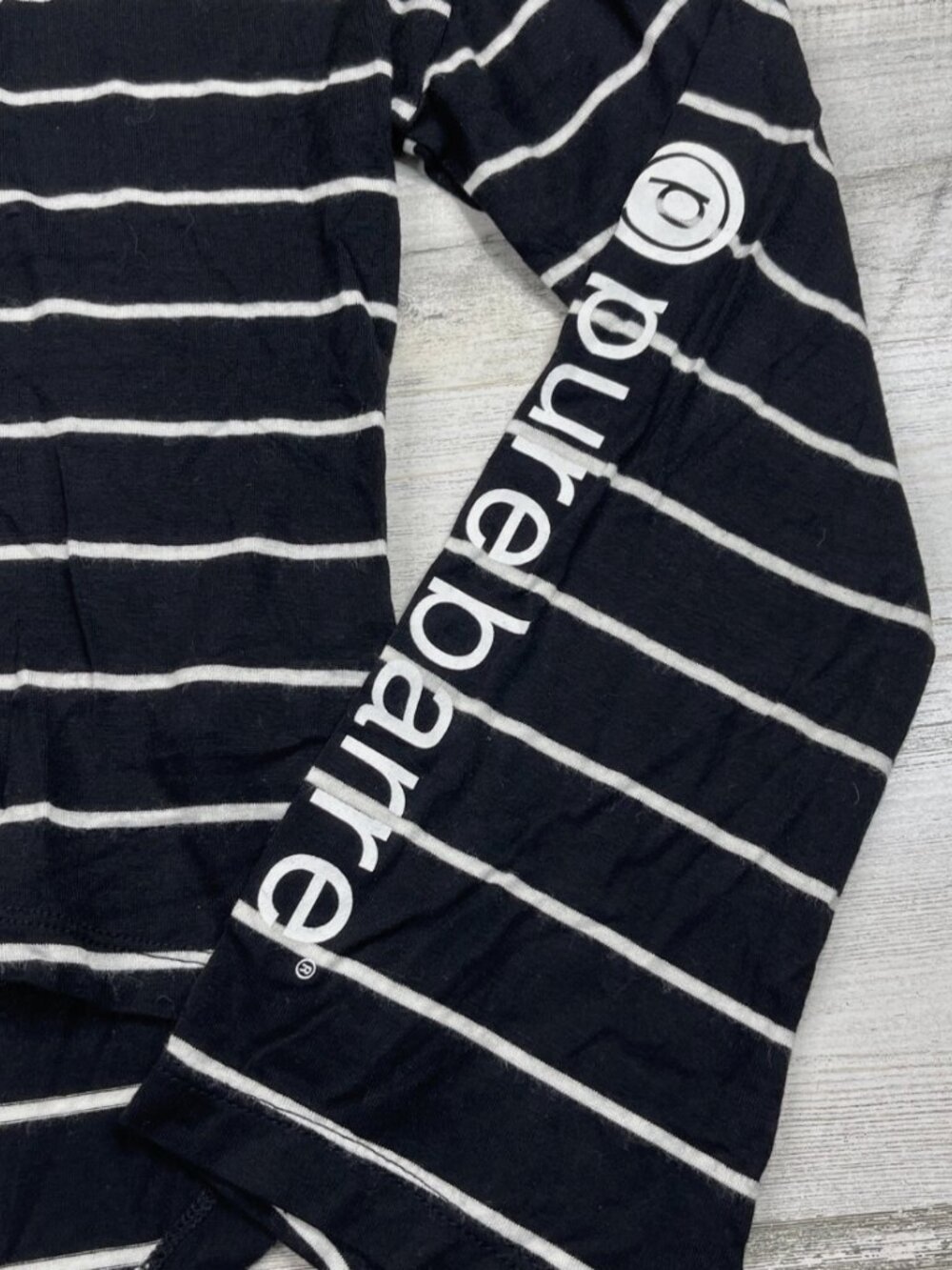 Pure Barre cropped black striped tee // M